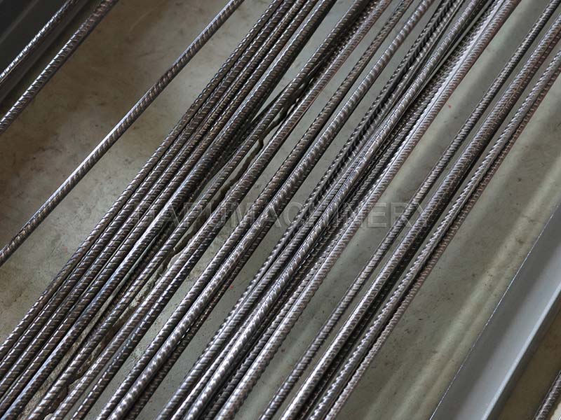 Finished 3-6m two-rib ribbed rebar bars produced by JIAKE machine bundled in Tunisia.